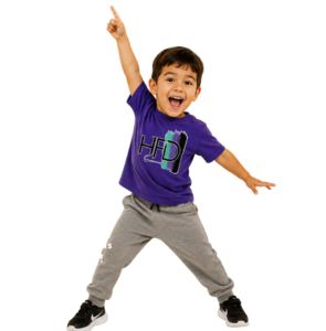 Small Boy in purplr t-shirt in disco dance pose.